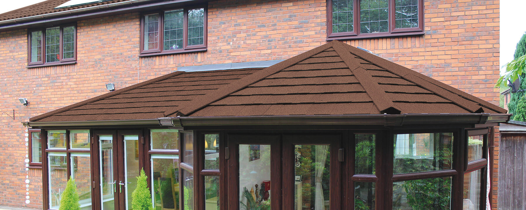 Bespoke conservatory with a tiled roof