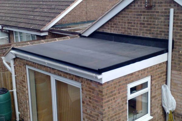 Home extension with a flat rubber roof