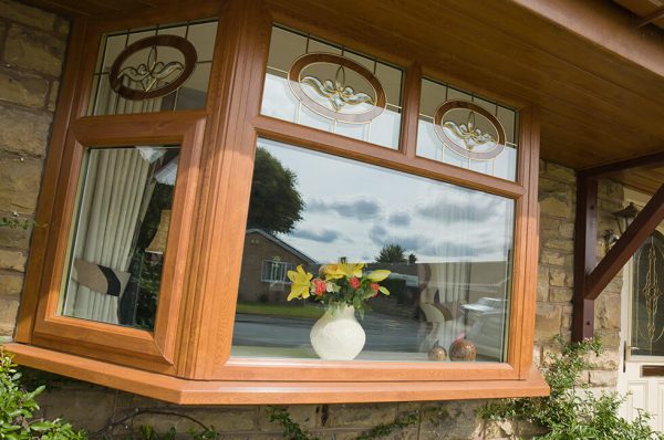 Golden oak effect uPVC bay window