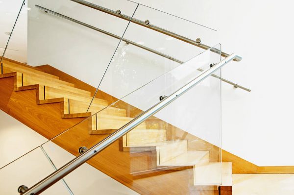 Glass balustrade with a metal railing